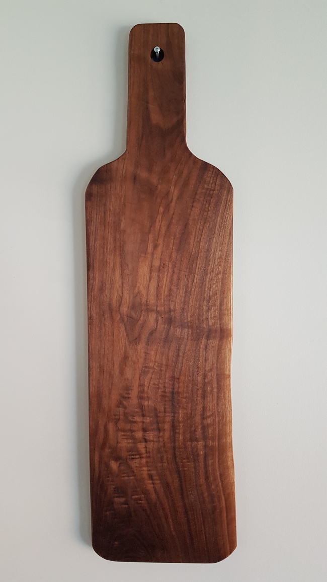 back of board mounted on a wall